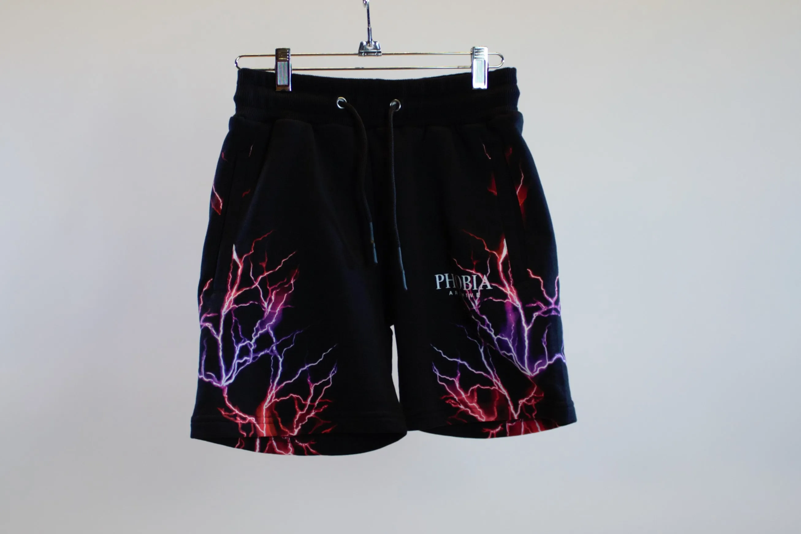 BLACK SHORTS WITH VIOLET LIGHTING